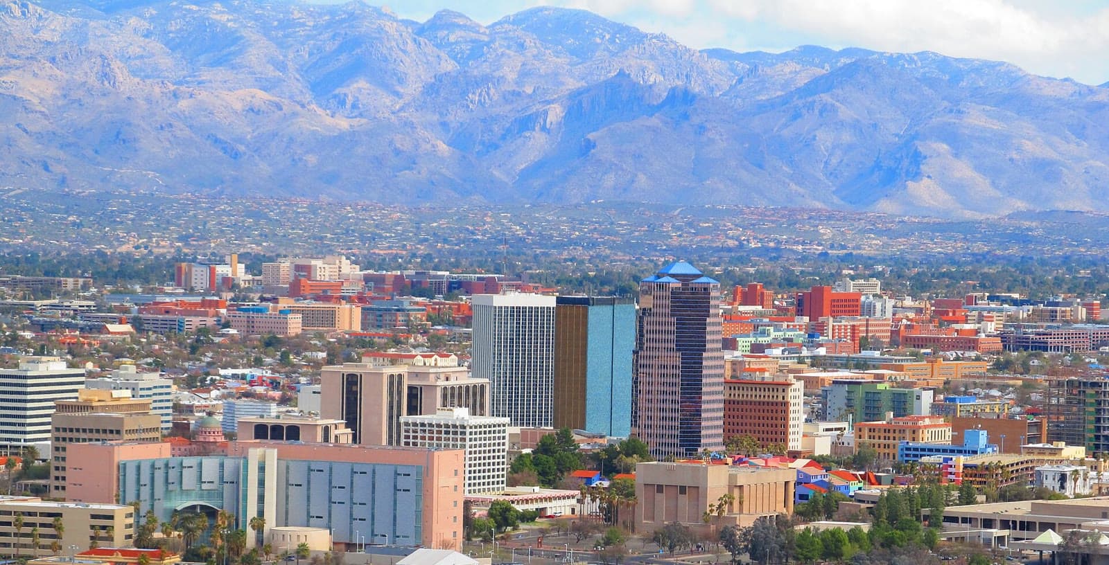 Downtown Tucson below the Santa Catalina Mountains, seen from Sentinel Peak: Rockstarr Media is casting new faces in Tucson