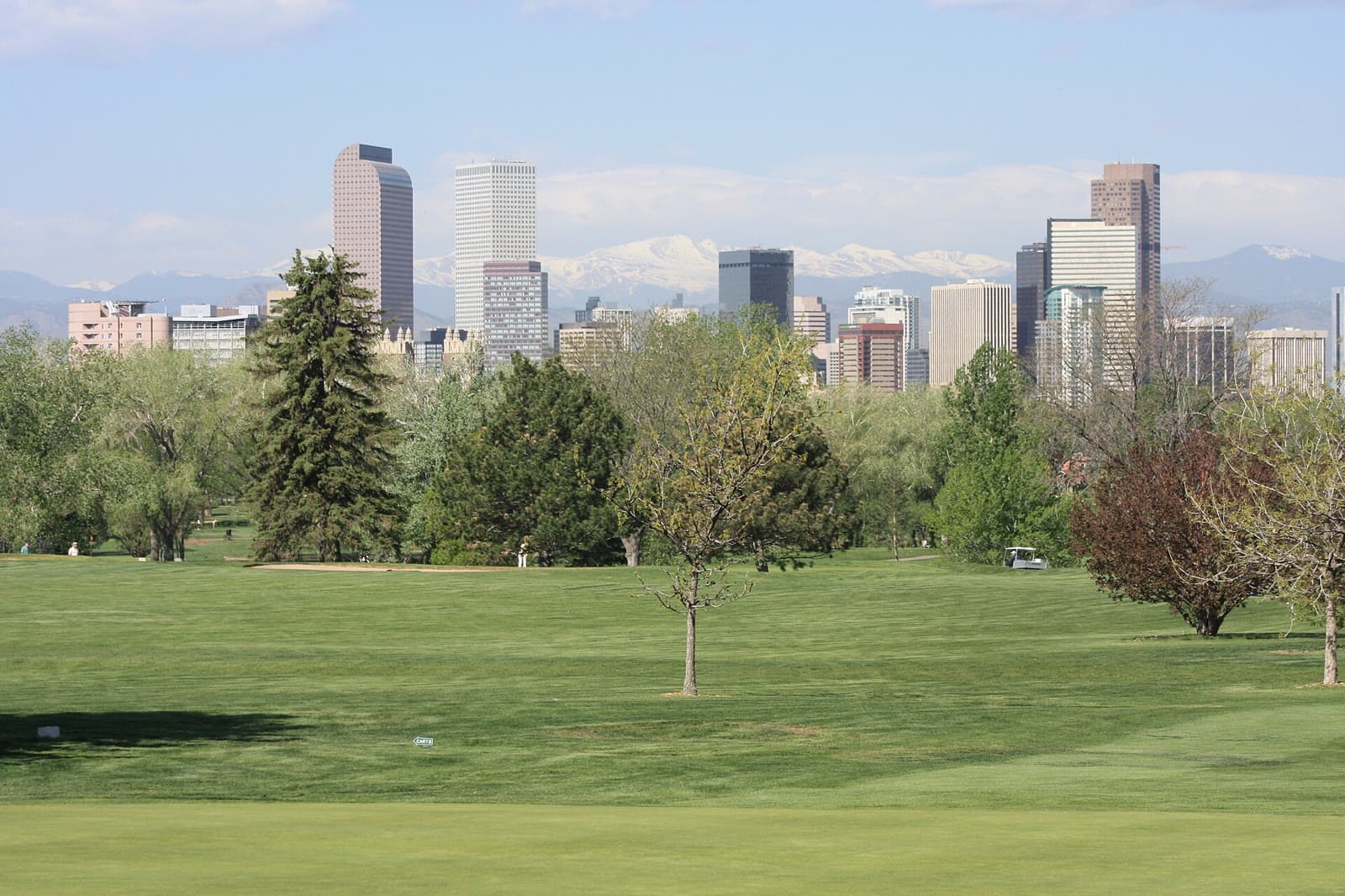 The downtown Denver skyline above the green lawns of City Park: Rockstarr Media is casting new faces in Denver