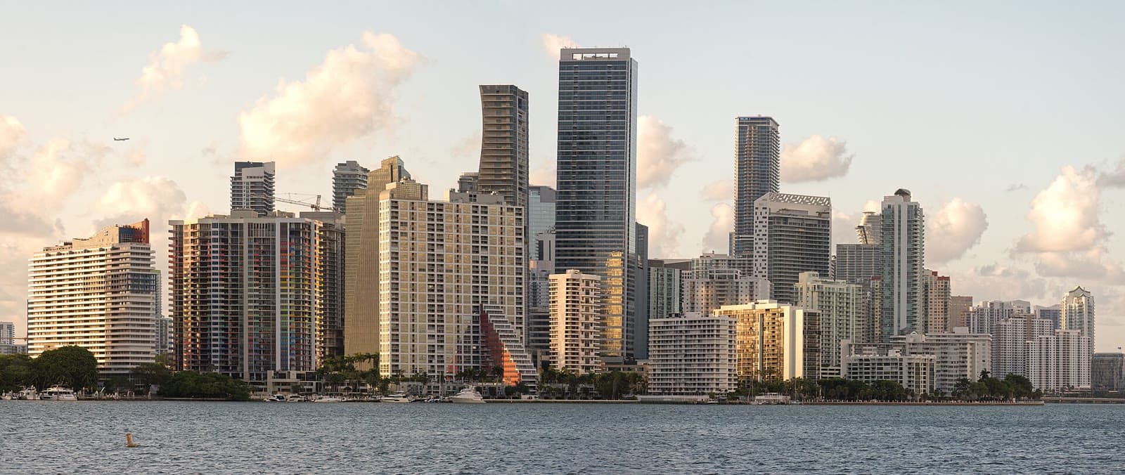 The Brickell skyline across Biscayne Bay in Miami: Rockstarr Media is casting new faces in Miami