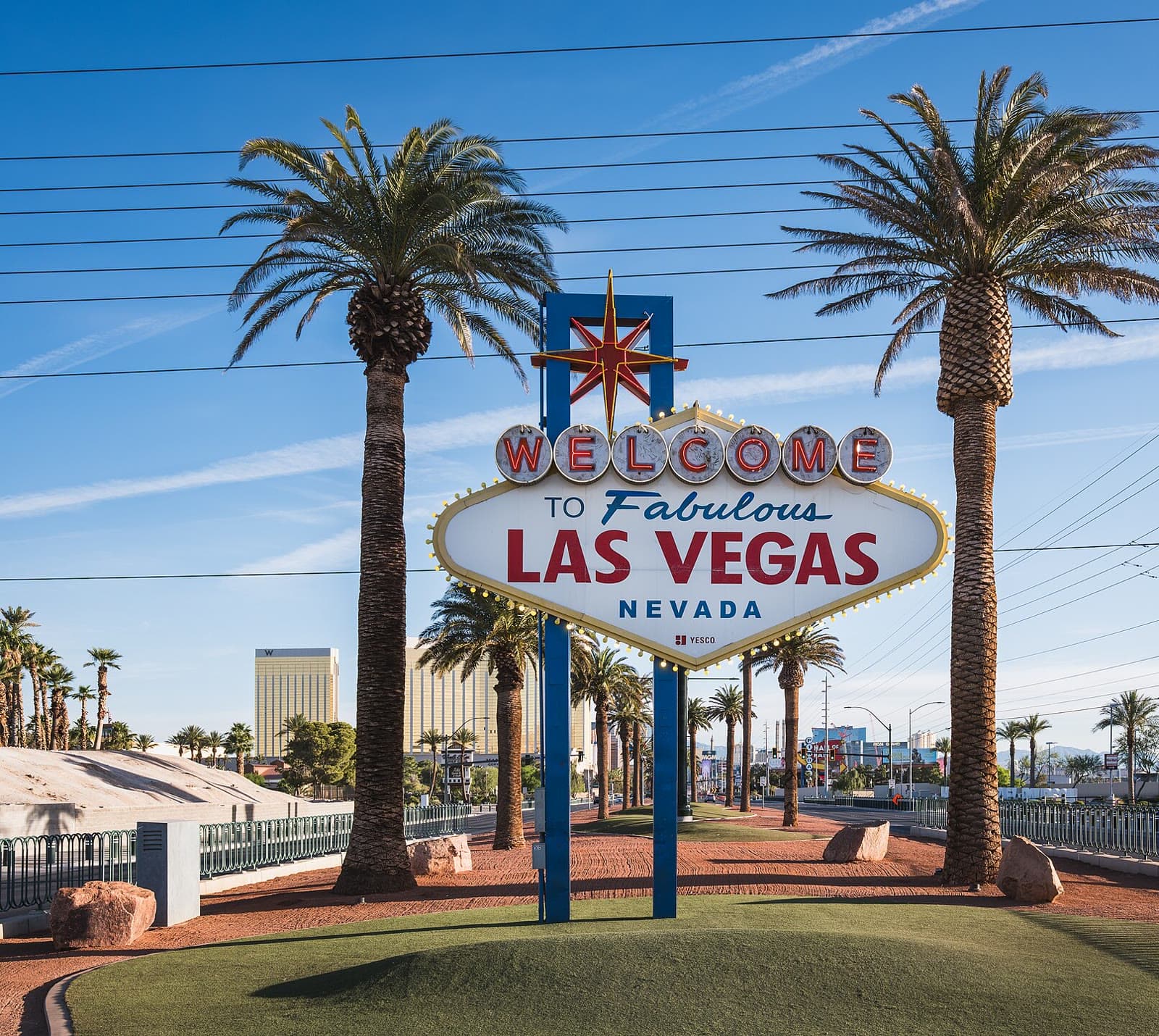 The Welcome to Fabulous Las Vegas sign framed by palm trees: Rockstarr Media is casting new faces in Las Vegas