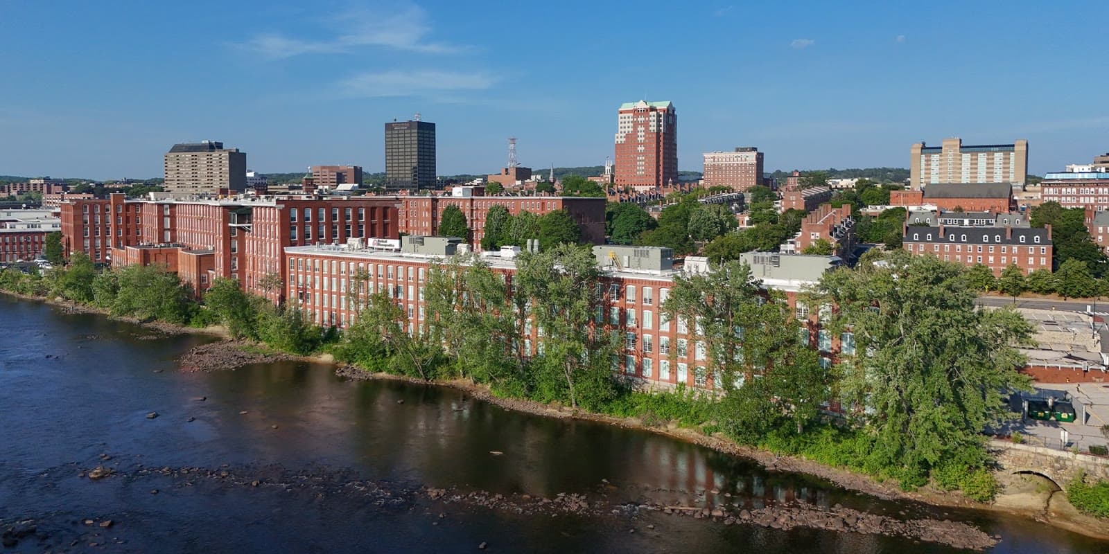 The millyard and downtown manchester along the merrimack river: Rockstarr Media is casting new faces in Manchester