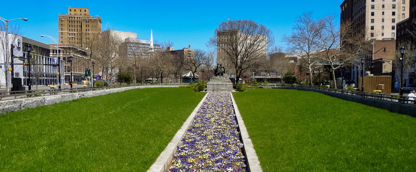 Military Park and downtown Newark under a clear blue sky: Rockstarr Media is casting new faces in Newark
