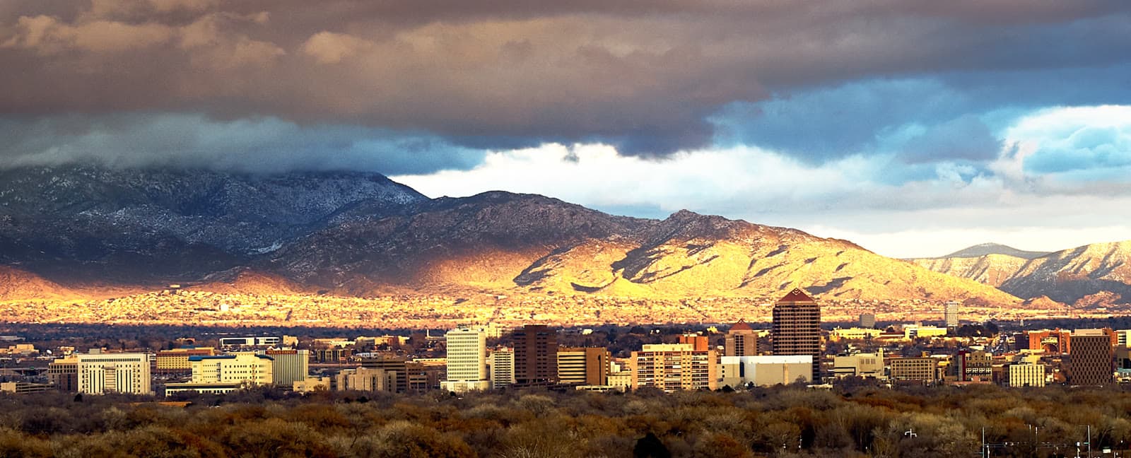 Downtown albuquerque below the sandia mountains: Rockstarr Media is casting new faces in Albuquerque