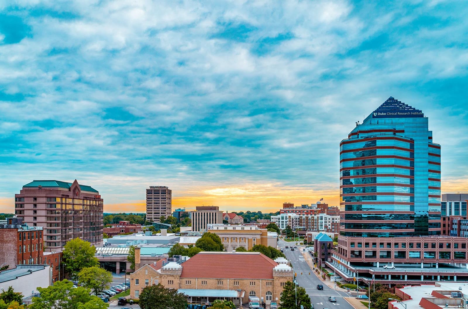 Downtown Durham's skyline at sunset: Rockstarr Media is casting new faces in Durham & Chapel Hill