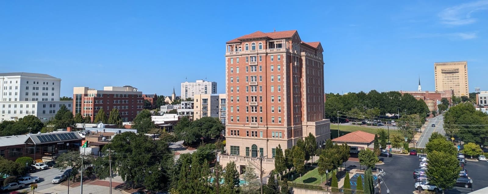 Downtown Spartanburg under a clear blue sky: Rockstarr Media is casting new faces in Spartanburg