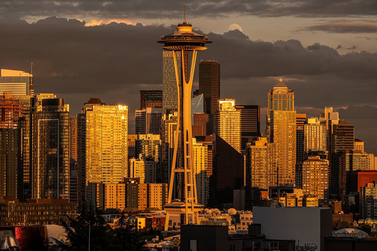 The Space Needle and downtown Seattle glowing at sunset: Rockstarr Media is casting new faces in Seattle