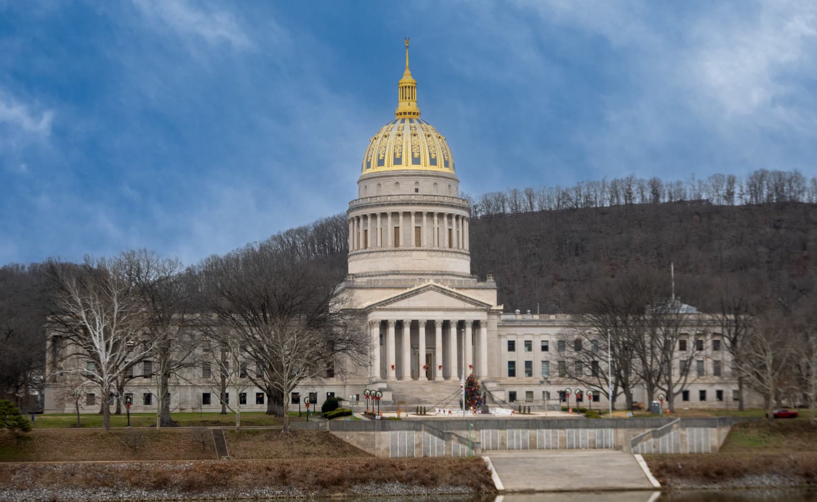 The gold-domed West Virginia State Capitol on the Kanawha River: Rockstarr Media is casting new faces in Charleston