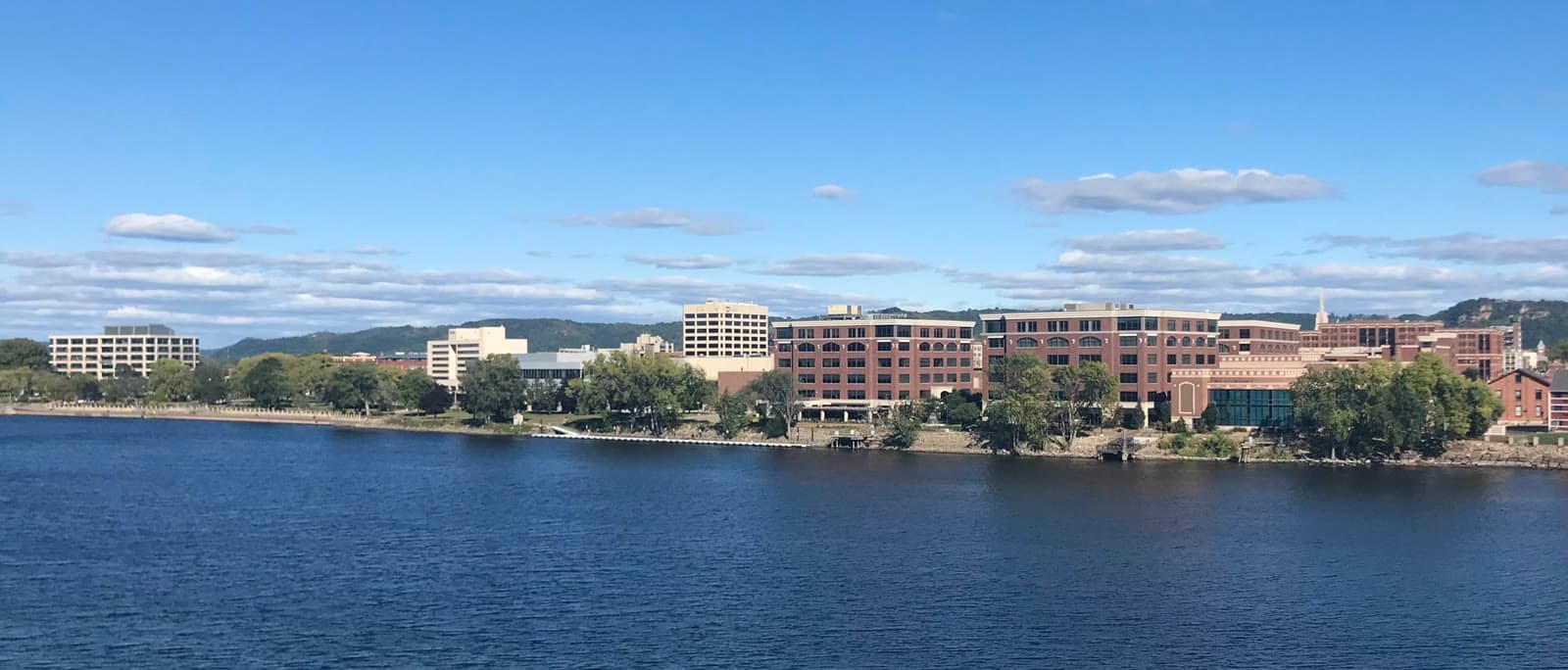 Downtown La Crosse on the Mississippi with the bluffs behind: Rockstarr Media is casting new faces in La Crosse